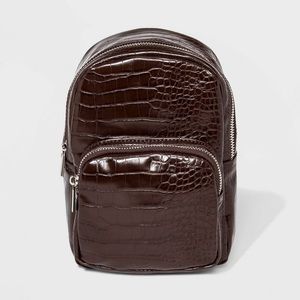 Mini sling backpack
